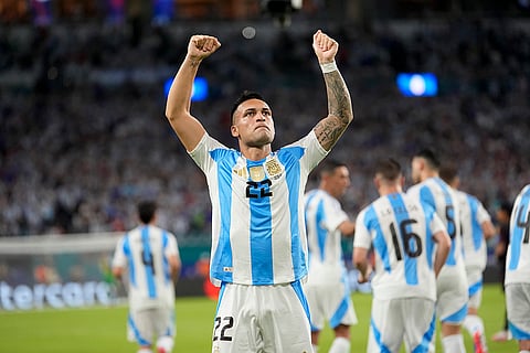 Lautaro Martínez celebrates scoring his side's opening goal 